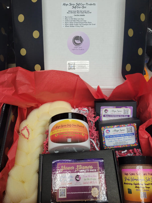 Self care gift box for women with whipped body butter, pink himalayan salt scrub, shower steamers, a long loofah sponge and two handmade soaps